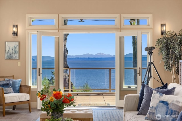 interior space featuring a water and mountain view