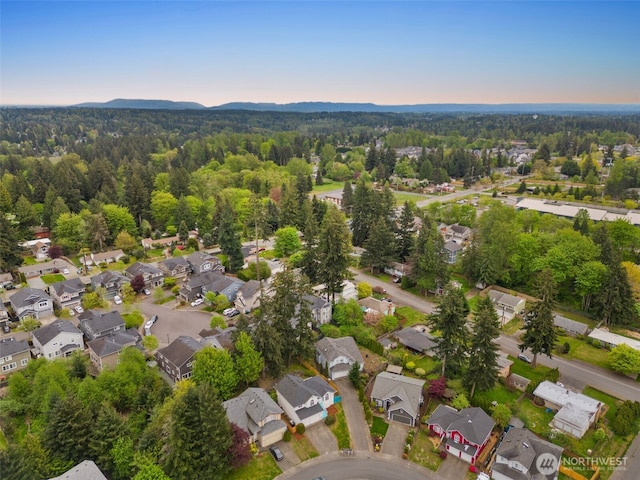 aerial view with a residential view and a forest view