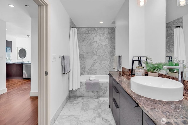 full bathroom with recessed lighting, baseboards, vanity, and marble finish floors