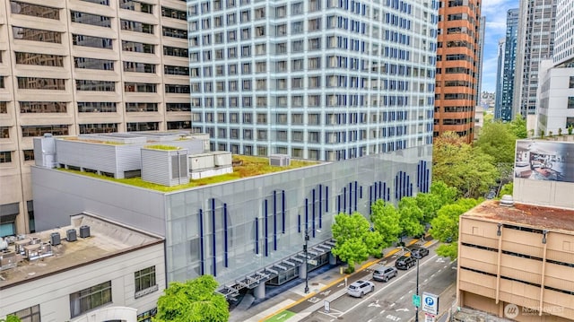 view of building exterior with a city view