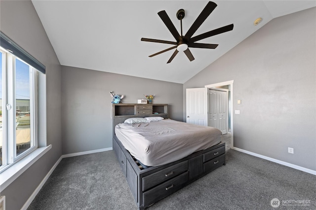 bedroom with vaulted ceiling, carpet flooring, baseboards, and ceiling fan