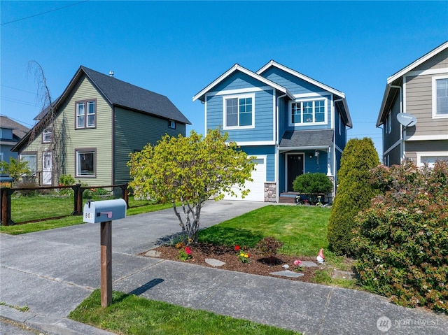 view of front of house featuring a front lawn, aphalt driveway, stone siding, fence, and a garage