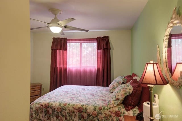 6110 24th Ave NW Unit 203, Seattle, WA 98107 - bedroom featuring a ceiling fan
