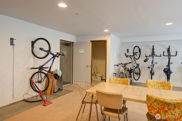 6110 24th Ave NW Unit 203, Seattle, WA 98107 - dining room with recessed lighting and light colored carpet