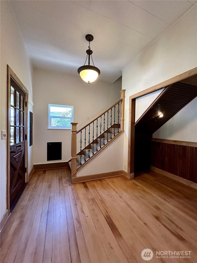 1145 Blaine St, Port Townsend, WA 98368 - foyer entrance with hardwood / wood-style flooring, baseboards, and stairs