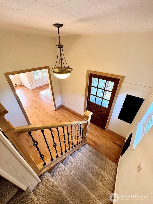 1145 Blaine St, Port Townsend, WA 98368 - stairs with wood finished floors and baseboards