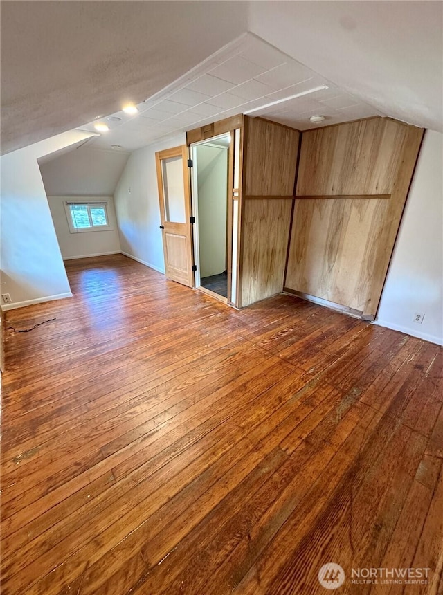 1145 Blaine St, Port Townsend, WA 98368 - bonus room featuring wood-type flooring, vaulted ceiling, and baseboards