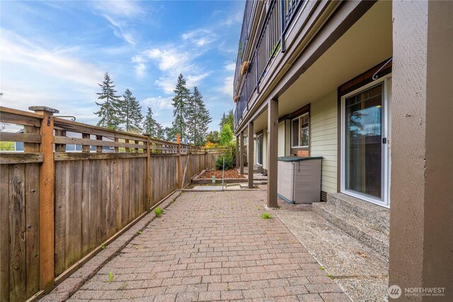 view of patio with fence
