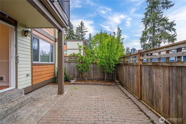 view of patio with a fenced backyard