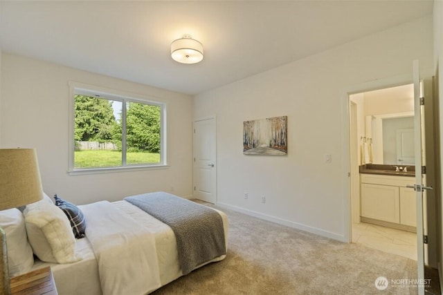 16106 Broadway Ave, Snohomish, WA 98296 - bedroom with baseboards, light carpet, a sink, and ensuite bath