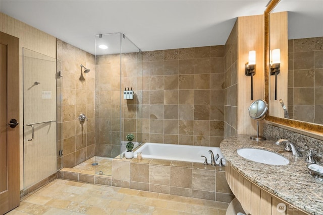 3600 Suncadia Trl Unit 4018, Cle Elum, WA 98922 - full bath with a garden tub, a tile shower, tile walls, and vanity