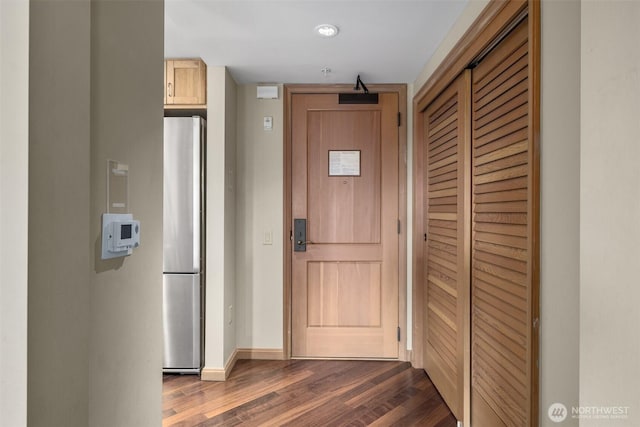 3600 Suncadia Trl Unit 4018, Cle Elum, WA 98922 - entryway with baseboards and dark wood-type flooring