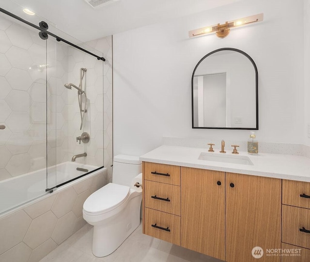 5023 Harbor Hills Dr, Freeland, WA 98249 - full bath with tile patterned floors, toilet, visible vents, vanity, and tiled shower / bath