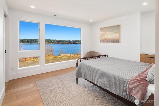 5023 Harbor Hills Dr, Freeland, WA 98249 - bedroom with visible vents, recessed lighting, light wood-style floors, and multiple windows