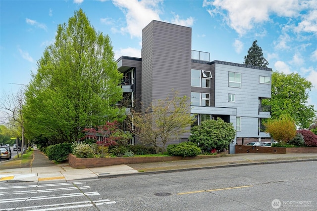 exterior space featuring uncovered parking