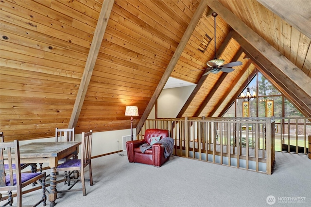 interior space featuring carpet floors, vaulted ceiling with beams, and wood ceiling