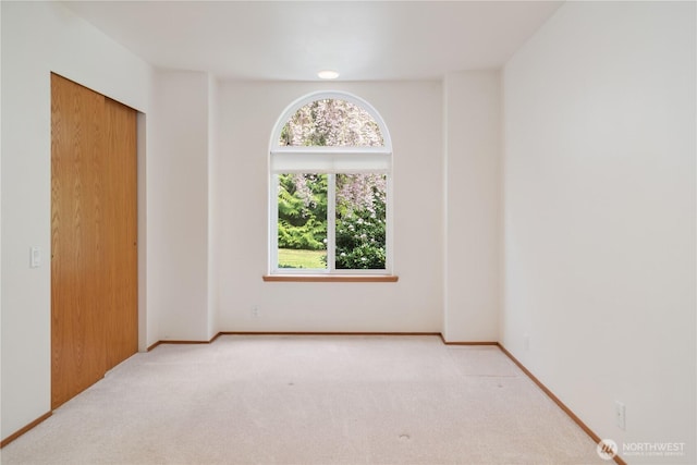 view of carpeted spare room
