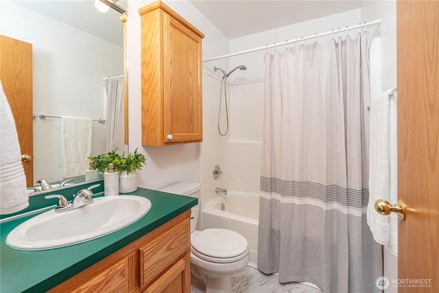 full bathroom featuring shower / bath combo, toilet, and vanity