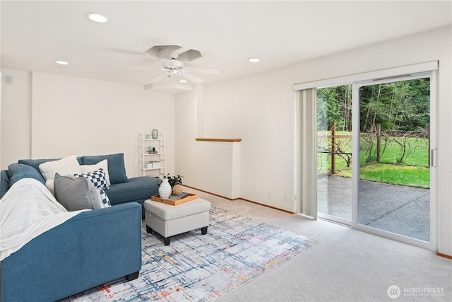 living room featuring carpet, baseboards, recessed lighting, and ceiling fan