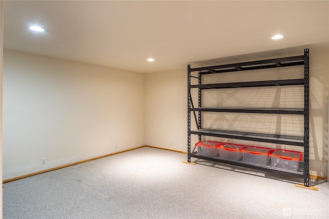 interior space featuring recessed lighting, carpet flooring, and baseboards