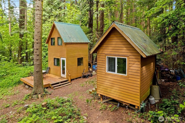 89 Eliza Is, Bellingham, WA 98226 - view of outdoor structure featuring a forest view