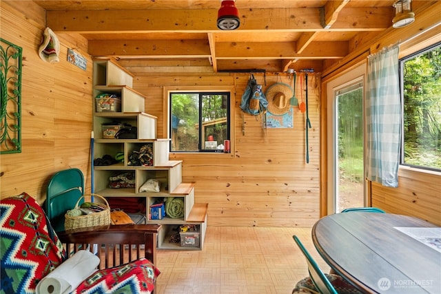 89 Eliza Is, Bellingham, WA 98226 - interior space with wooden walls, beamed ceiling, and multiple windows