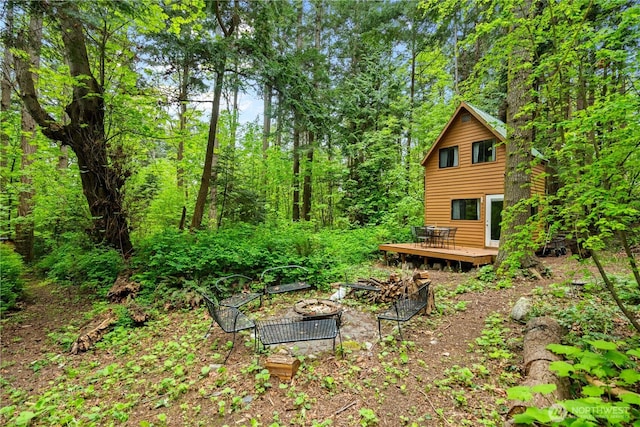 89 Eliza Is, Bellingham, WA 98226 - view of yard featuring a fire pit and a deck