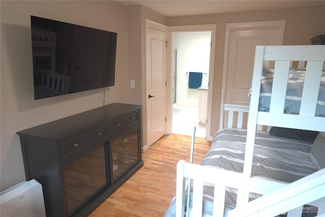 bedroom with light wood-style flooring