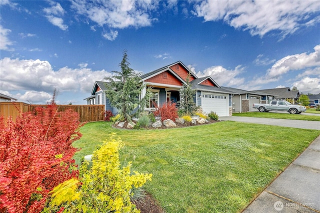 110 Blue Glacier Loop, Sequim, WA 98382 - craftsman-style home with an attached garage, fence, driveway, and a front yard