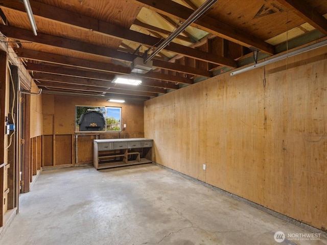basement with wood walls