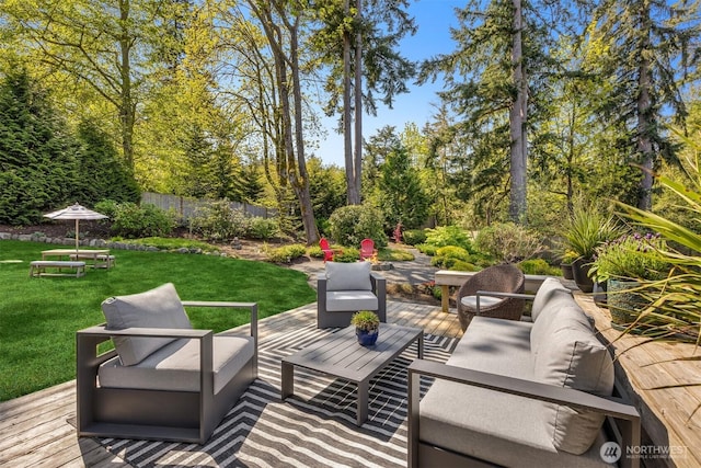 view of patio with an outdoor hangout area and fence