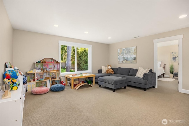 recreation room with recessed lighting, carpet, and visible vents