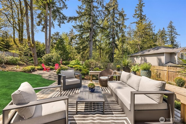 view of patio / terrace featuring an outdoor hangout area and a fenced backyard