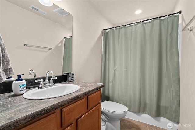full bathroom with toilet, vanity, shower / tub combo with curtain, and visible vents