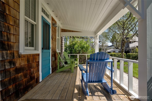 wooden deck with a porch