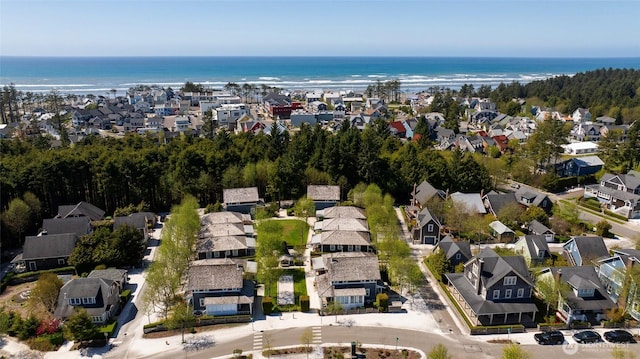 aerial overview of property's location with nearby suburban area and a large body of water