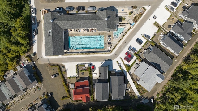 drone / aerial view of a pool area