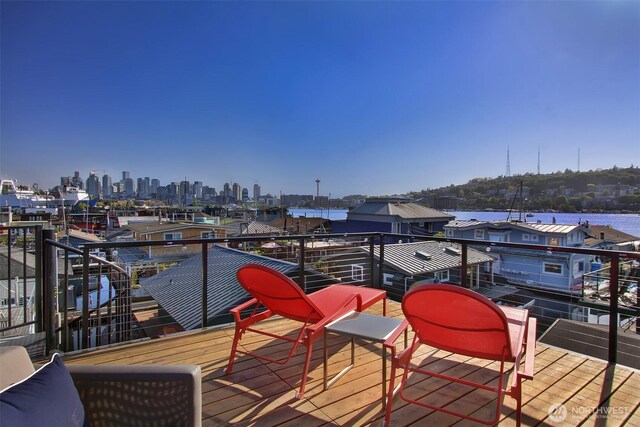 wooden terrace with a water view