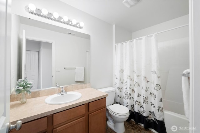 full bath featuring visible vents, vanity, tile patterned floors, toilet, and shower / tub combo with curtain