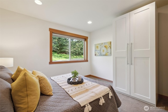 carpeted bedroom with baseboards and recessed lighting