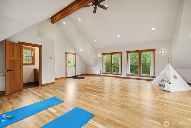 exercise area featuring recessed lighting, a wealth of natural light, and ceiling fan