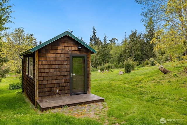 view of outbuilding with an outbuilding