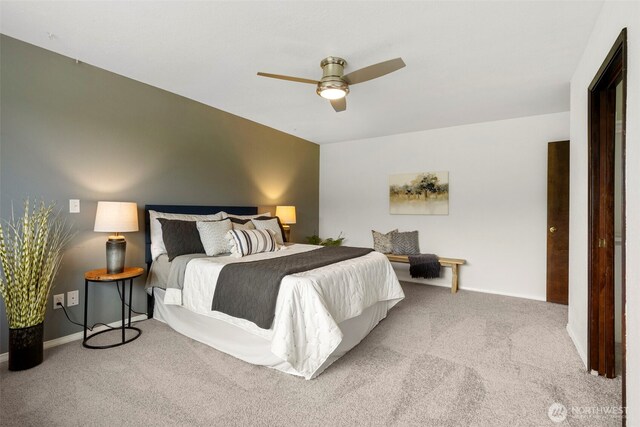 bedroom with baseboards, carpet flooring, and ceiling fan