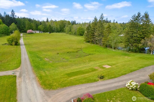 exterior space featuring dirt driveway