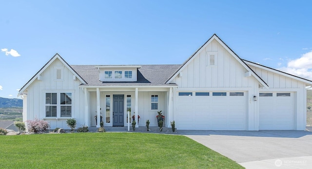 1580 S Kelvin Ct, East Wenatchee, WA 98802 - modern farmhouse style home with board and batten siding, concrete driveway, an attached garage, a shingled roof, and a front lawn