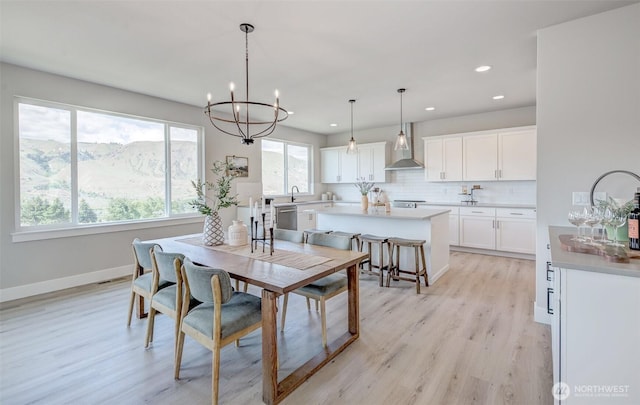 1580 S Kelvin Ct, East Wenatchee, WA 98802 - dining room featuring light wood-style flooring, recessed lighting, a chandelier, and baseboards
