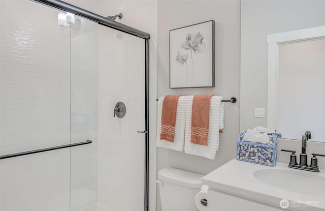 1580 S Kelvin Ct, East Wenatchee, WA 98802 - bathroom with a stall shower, vanity, and toilet