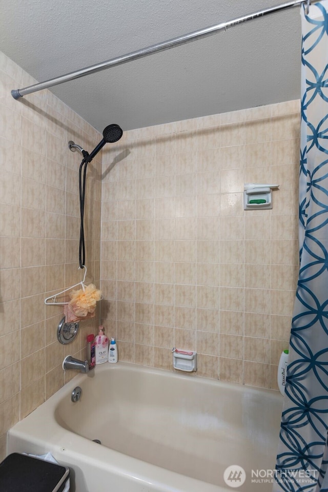 2534 S 317th St Unit 103, Federal Way, WA 98003 - bathroom featuring shower / bath combo with shower curtain