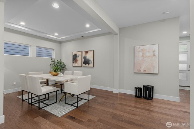 1221 199th St SE, Bothell, WA 98012 - dining area featuring wood finished floors, baseboards, recessed lighting, and a tray ceiling
