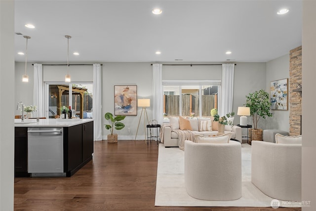 1221 199th St SE, Bothell, WA 98012 - living room featuring recessed lighting, dark wood-type flooring, and baseboards